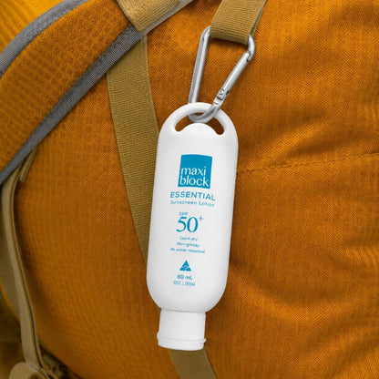 Maxiblock Essential Everyday Sunscreen SPF 50+ Attached To Yellow Hiking Bag