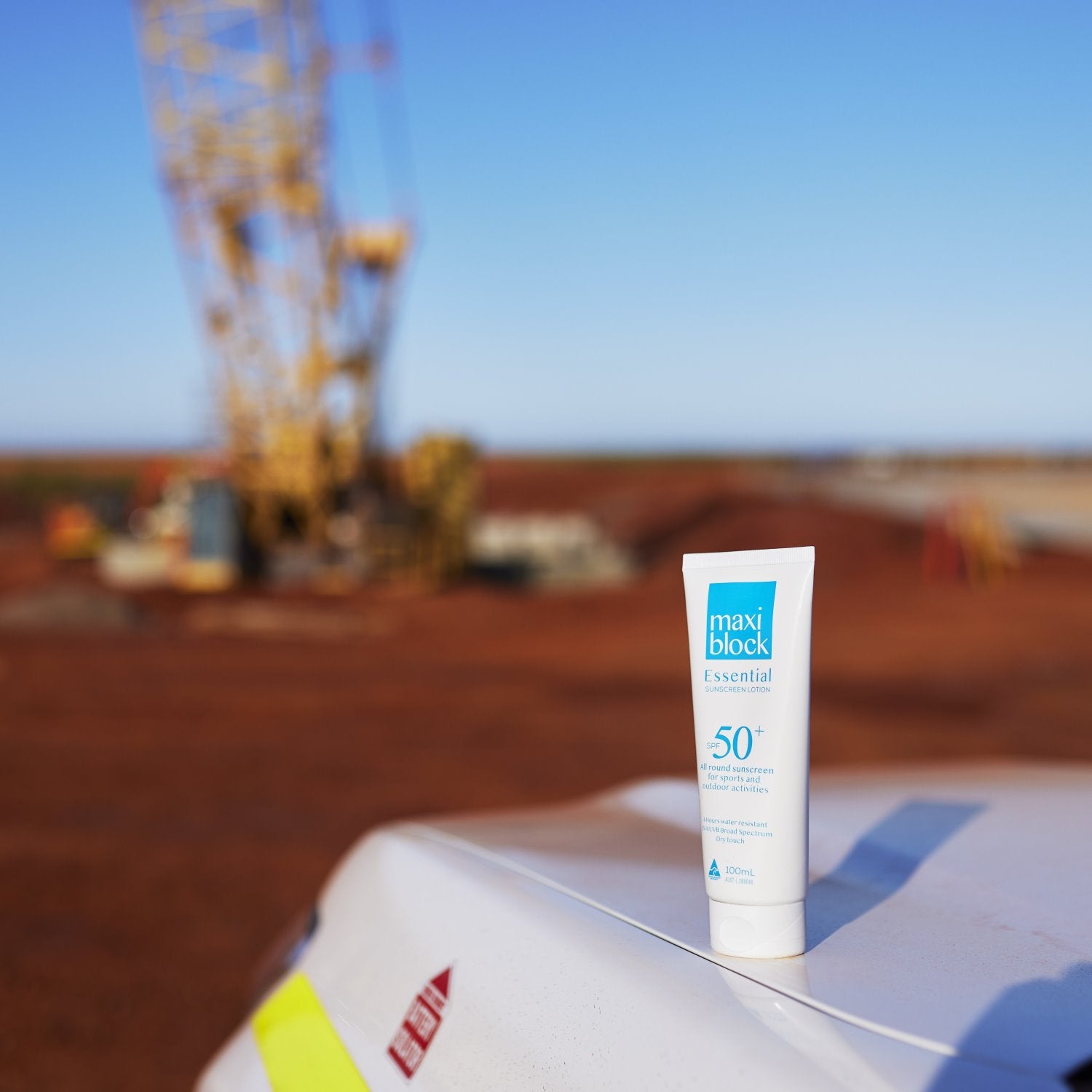 Maxiblock Essential SPF 50+ 100mL tube on a ute at an Australian mining site