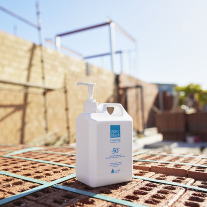 Everyday sunscreen with pump on a brick surface outdoors