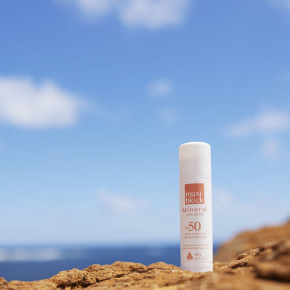 zinc stick on rocks by the sea